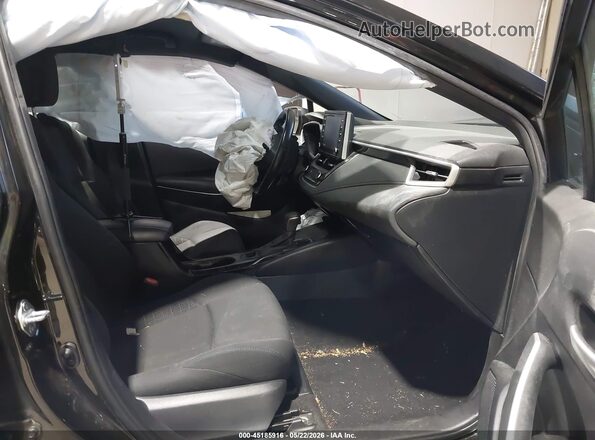 JTDS4MCE8MJ065285 2021 TOYOTA COROLLA Black Front interior view