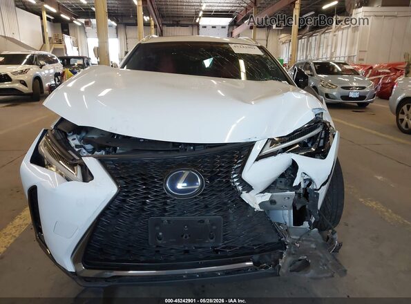 JTHU9JBH9K2009706 2019 LEXUS UX 250H White ხელსაწყოთა პანელის ხედი