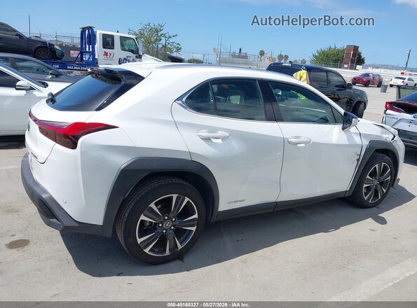 JTHX9JBH5N2055700 2022 LEXUS UX 250H Белый Вид задней части салона