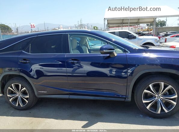 JTJDGKCA2J2004597 2018 LEXUS RX 450HL Dark Blue Vista interior trasera