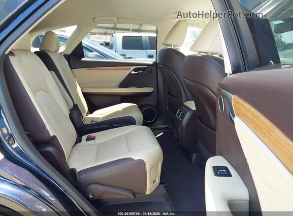 JTJDGKCA2J2004597 2018 LEXUS RX 450HL Dark Blue Vista de la etiqueta del VIN
