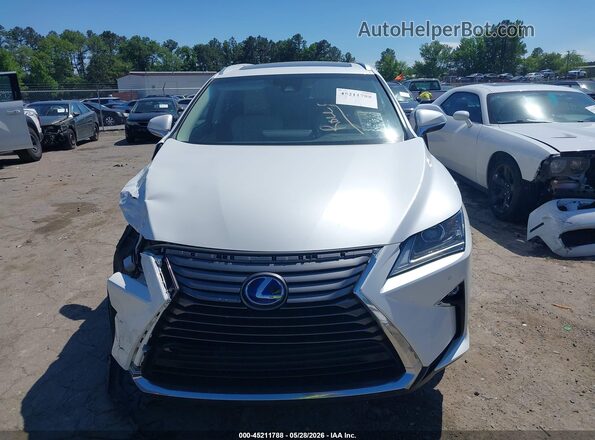 JTJDGKCAXJ2000653 2018 LEXUS RX 450HL White Widok wnętrza z tyłu