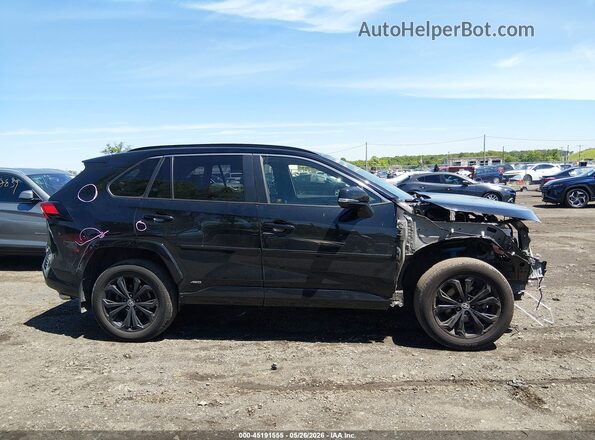 JTM16RFV0NJ022723 2022 TOYOTA RAV4 HYBRID Black Widok wnętrza z tyłu