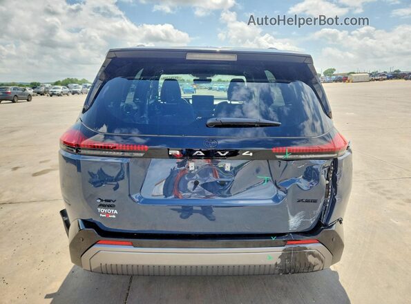 JTM6CRAV8TD001393 2026 TOYOTA RAV4 Blue Вид ззаду