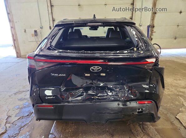 JTMAAAAA7RA047693 2024 TOYOTA BZ4X Black Вид ззаду