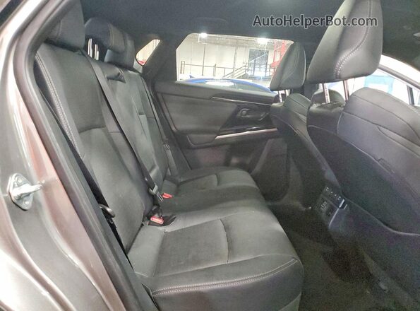 JTMABABA6RA086402 2024 SUBARU SOLTERRA Gray Rear interior view