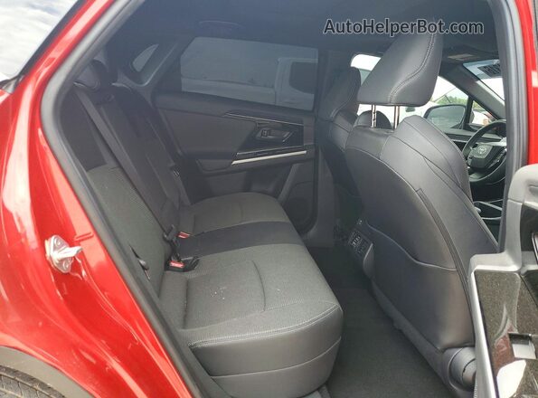 JTMABACAXRA065583 2024 TOYOTA BZ4X Red Vista interior trasera
