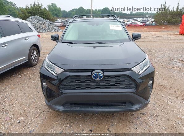 JTMB6RFV0MD034792 2021 TOYOTA RAV4 HYBRID Черный Вид щитка приборов