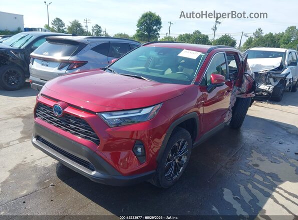JTMB6RFV5PD091784 2023 TOYOTA RAV4 HYBRID Red Vista tres cuartos delantera izquierda