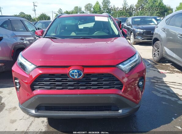 JTMB6RFV5PD091784 2023 TOYOTA RAV4 HYBRID Red Vista del salpicadero