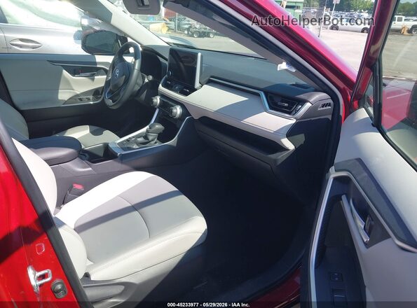JTMB6RFV5PD091784 2023 TOYOTA RAV4 HYBRID Red Vista interior delantera