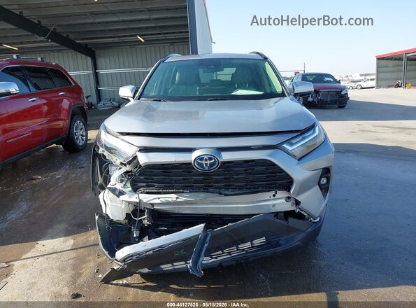 JTMB6RFV5PD542048 2023 TOYOTA RAV4 HYBRID Silver Вид задньої частини салону