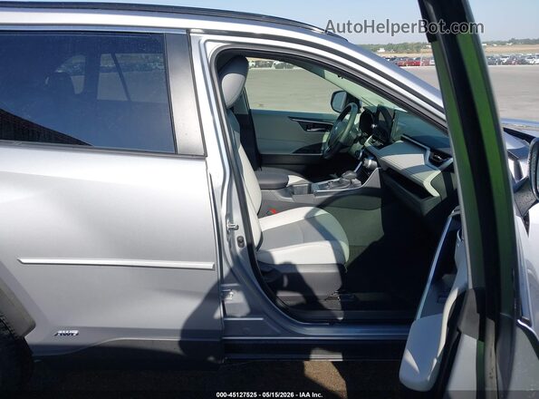 JTMB6RFV5PD542048 2023 TOYOTA RAV4 HYBRID Silver Вид салону спереду