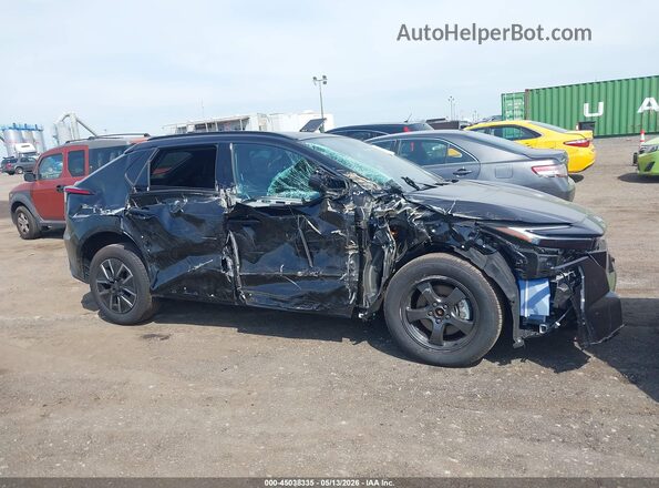 JTMBCAEB6TA001135 2026 TOYOTA LE Black Вид задньої частини салону