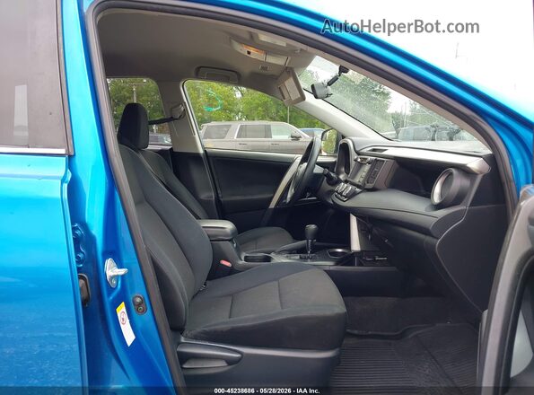 JTMBFREV2GJ073746 2016 TOYOTA RAV4 Blue Widok wnętrza z przodu