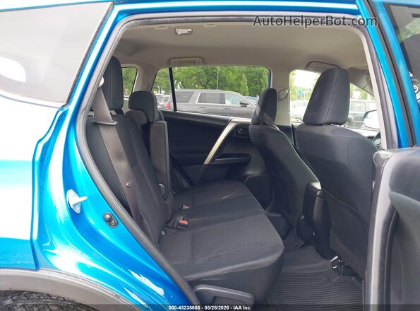 JTMBFREV2GJ073746 2016 TOYOTA RAV4 Blue Widok naklejki z numerem VIN