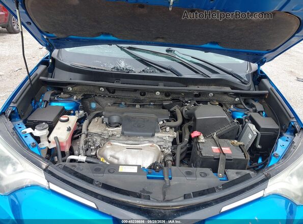 JTMBFREV2GJ073746 2016 TOYOTA RAV4 Blue Widok z tyłu