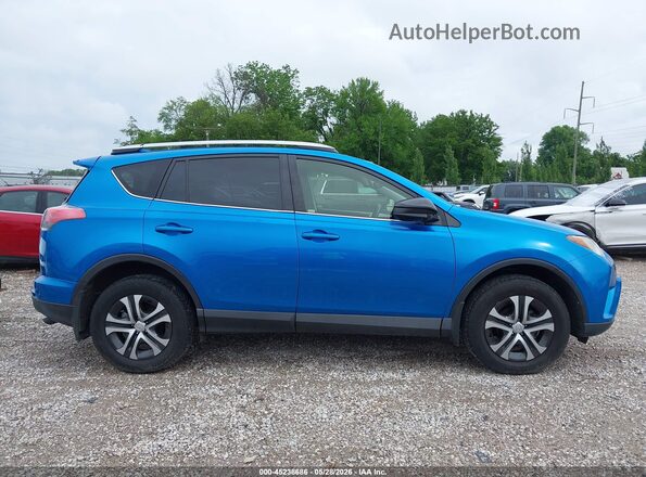 JTMBFREV2GJ073746 2016 TOYOTA RAV4 Blue Widok wnętrza z tyłu