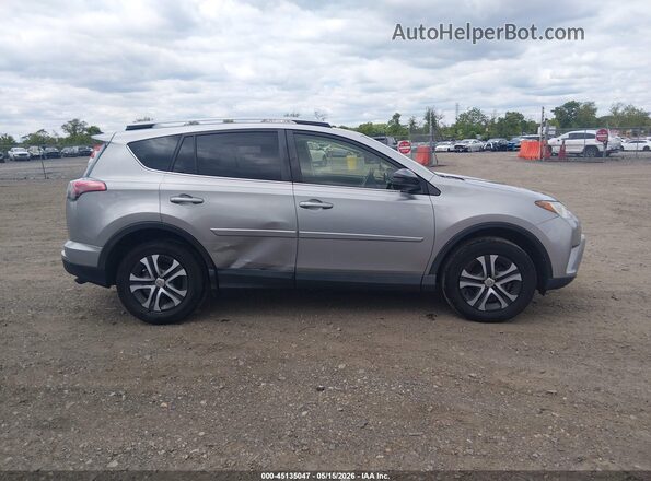 JTMBFREV2JJ202060 2018 TOYOTA RAV4 Silver Rear interior view