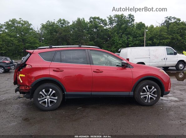 JTMBFREV4HJ140140 2017 TOYOTA RAV4 Red Вид задньої частини салону