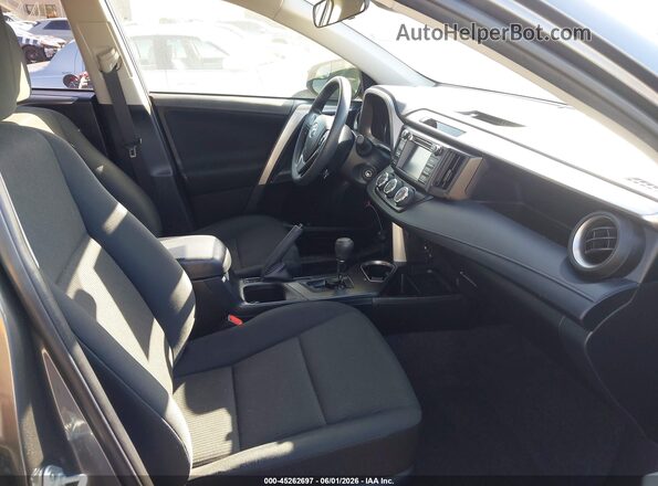 JTMBFREV4JD221711 2018 TOYOTA RAV4 Gray Front interior view