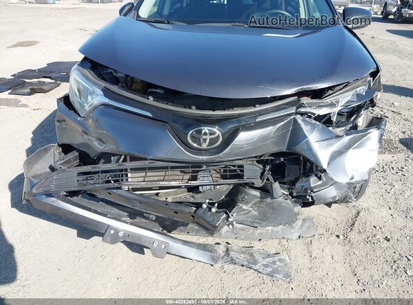 JTMBFREV4JD221711 2018 TOYOTA RAV4 Gray Front view
