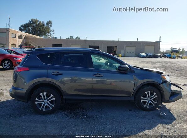 JTMBFREV4JD221711 2018 TOYOTA RAV4 Gray Rear interior view
