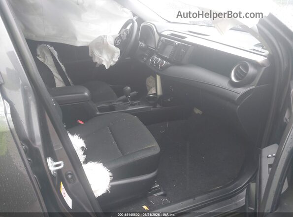JTMBFREV4JJ232144 2018 TOYOTA RAV4 Gray Widok wnętrza z przodu