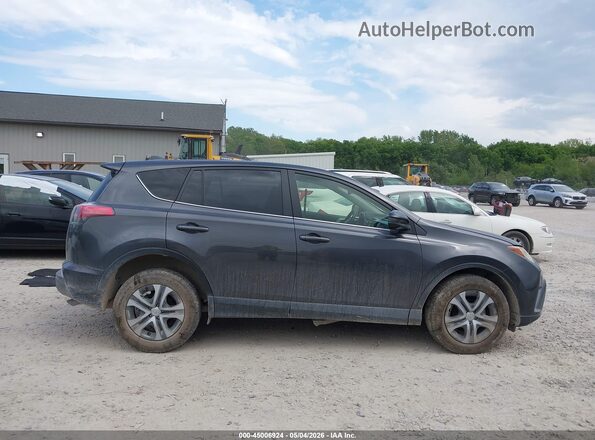 JTMBFREV5JJ257828 2018 TOYOTA LE Gray Սալոնի հետևի տեսք