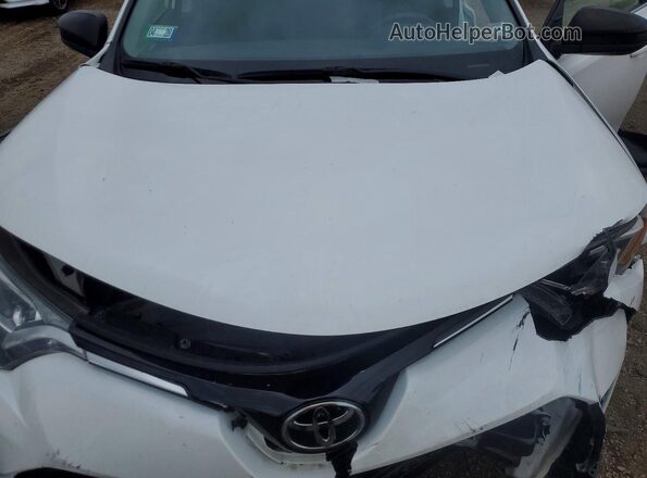 JTMBFREV5JJ746570 2018 TOYOTA RAV4 White Vista interior trasera