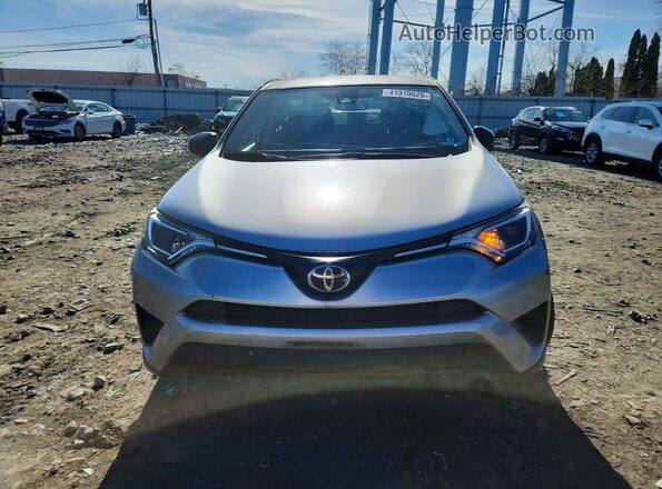 JTMBFREV6JJ196201 2018 TOYOTA LE Silver Widok z przodu