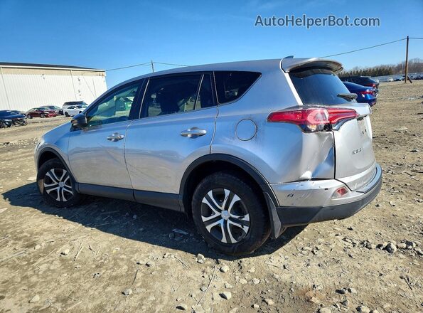 JTMBFREV6JJ196201 2018 TOYOTA LE Silver Tył lewy