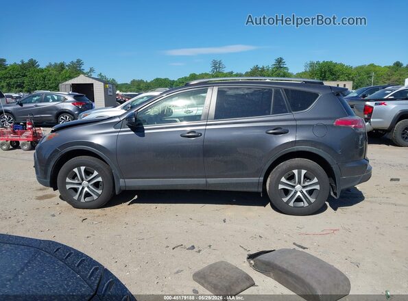 JTMBFREV6JJ721130 2018 TOYOTA RAV4 Gray Вид задньої частини салону