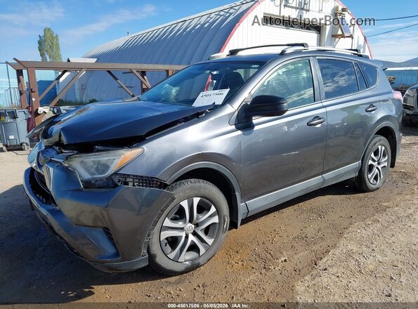 JTMBFREV9GD185670 2016 TOYOTA LE Gray Vista tres cuartos delantera izquierda