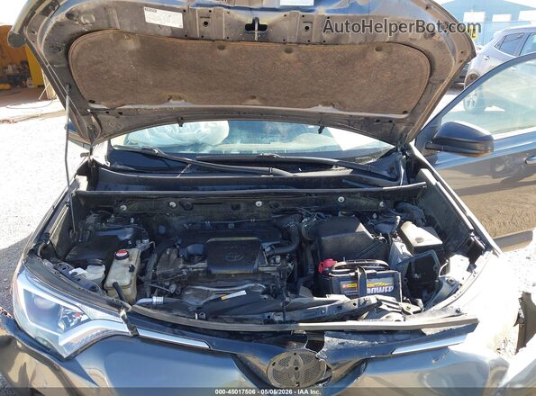 JTMBFREV9GD185670 2016 TOYOTA LE Gray Vista trasera