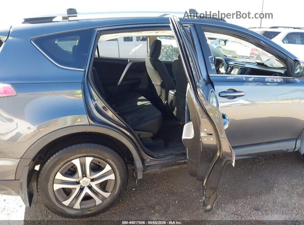 JTMBFREV9GD185670 2016 TOYOTA LE Gray Vista de la etiqueta del VIN