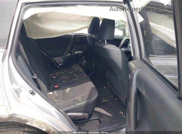 JTMBFREV9JJ218112 2018 TOYOTA LE Silver Vista de la etiqueta del VIN