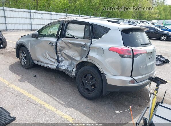 JTMBFREV9JJ218112 2018 TOYOTA LE Silver Trasero izquierdo