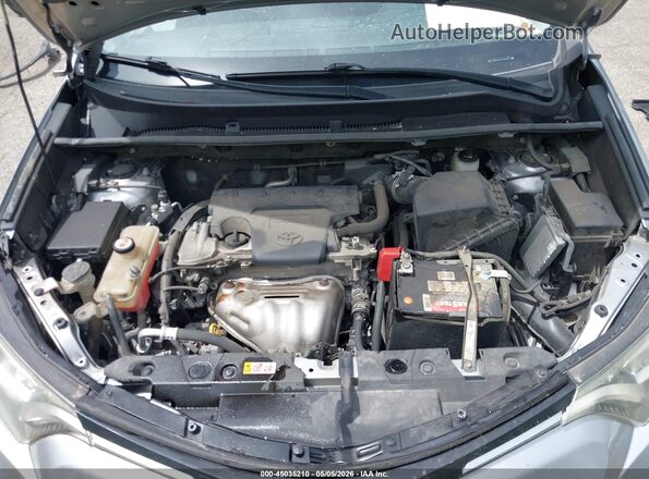 JTMBFREV9JJ218112 2018 TOYOTA LE Silver Vista trasera