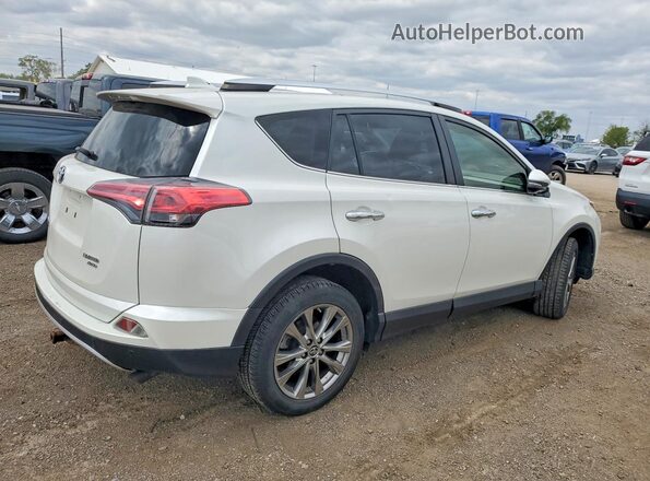 JTMDFREV0GJ061961 2016 TOYOTA RAV4 White 