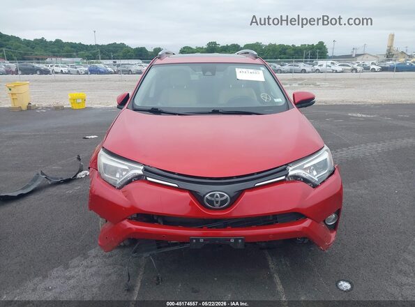 JTMDFREV2HJ145572 2017 TOYOTA RAV4 Red Vista interior trasera