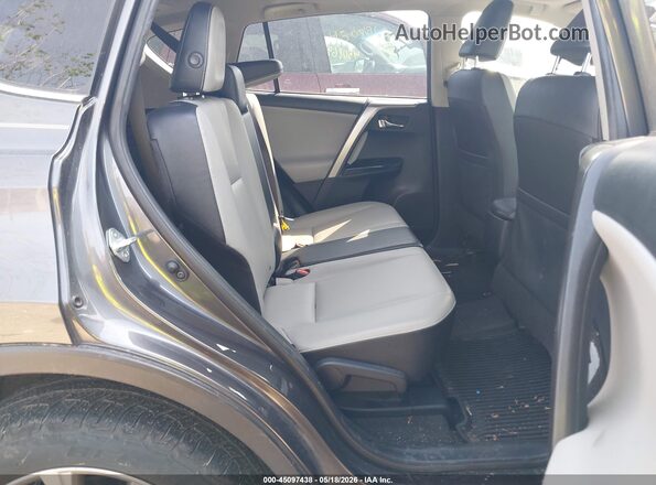 JTMDFREV6GJ076111 2016 TOYOTA RAV4 Gray Vista de la etiqueta del VIN