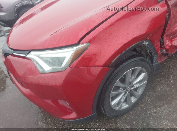 JTMDFREV8GJ067216 2016 TOYOTA RAV4 Red 