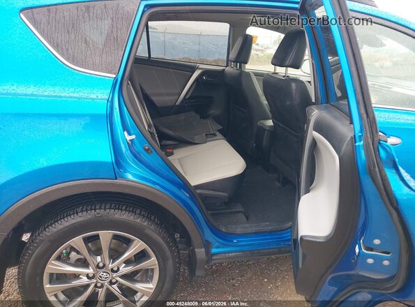 JTMDFREVXJJ218466 2018 TOYOTA RAV4 Blue Vista de la etiqueta del VIN