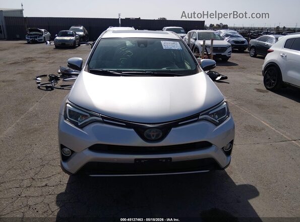 JTMDJREV0GD031436 2016 TOYOTA RAV4 HYBRID Silver უკანა სალონის ხედი