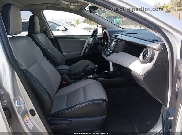 JTMDJREV0GD031436 2016 TOYOTA RAV4 HYBRID Silver წინა სალონის ხედი