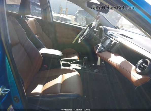 JTMDJREV2HD079408 2017 TOYOTA RAV4 HYBRID Blue Front interior view