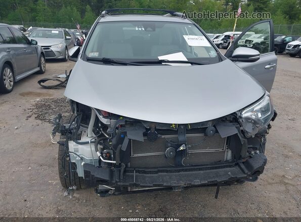 JTMDJREV6HD070596 2017 TOYOTA RAV4 HYBRID Silver Front view