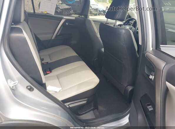 JTMDJREV6HD070596 2017 TOYOTA RAV4 HYBRID Silver VIN sticker view