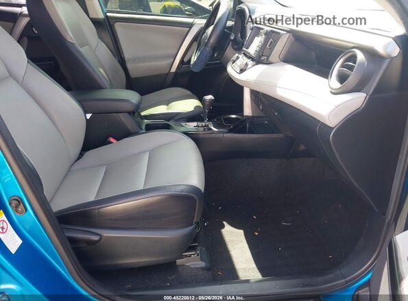 JTMDJREV9GD032553 2016 TOYOTA RAV4 HYBRID Blue Вид салону спереду
